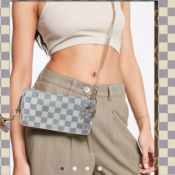 Louis Vuitton Handbags - Louis Vuitton
2009 Damier Azur Pattern Zippy Organizer Wallet & unbranded chain